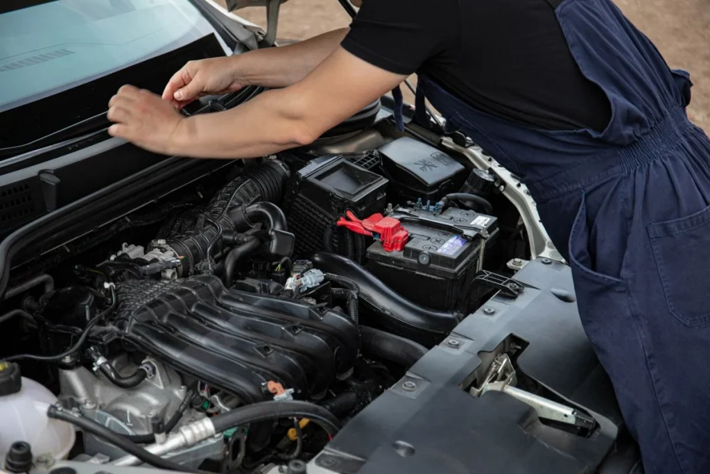 Illustrative close-up of vehicle engine maintenance